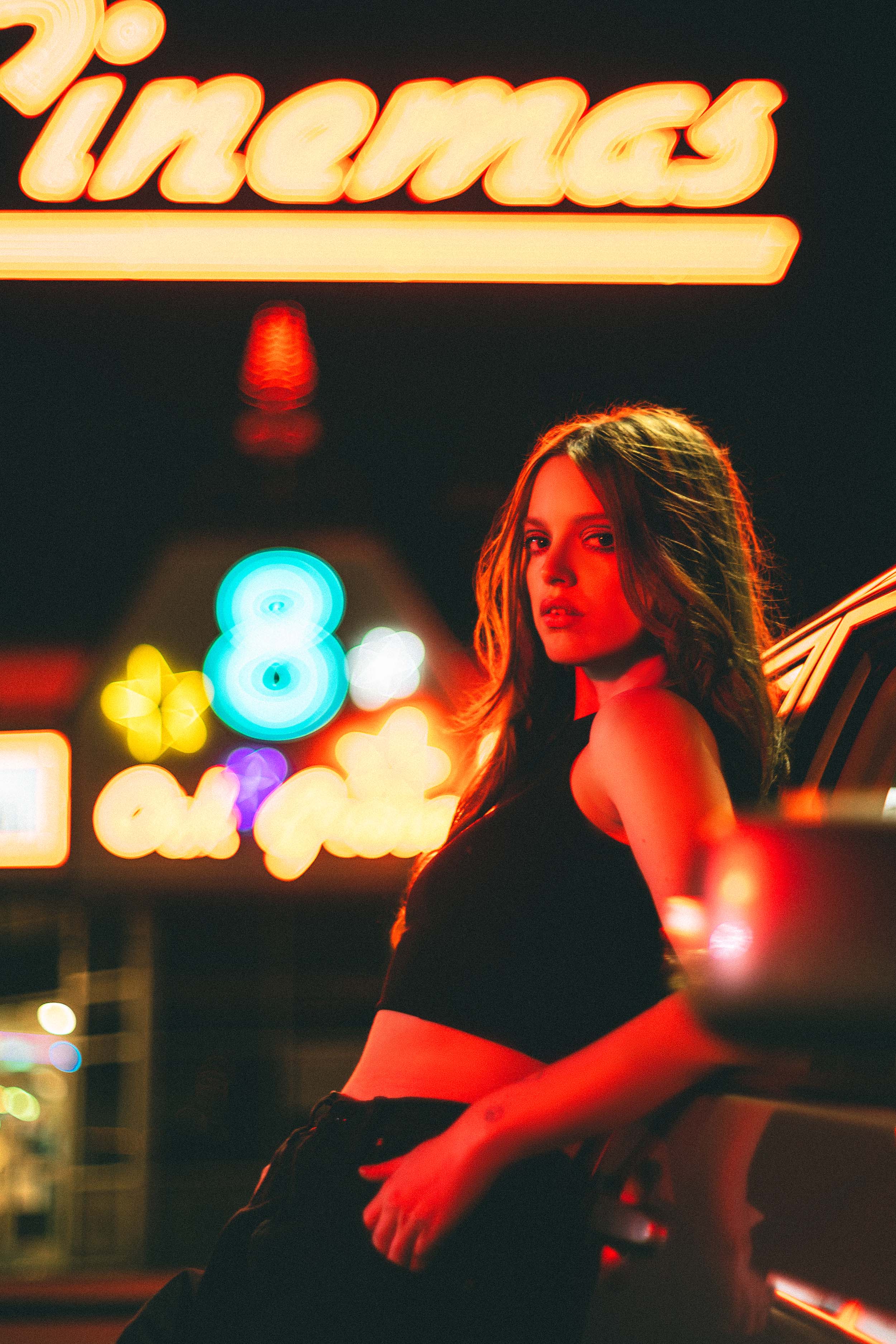Cinematic Portraits with Vintage Flair by a Movie Theater — photograph 26 of 35